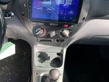 the interior of a car with a steering wheel, dashboard, and dash panel