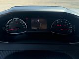 a view of a dashboard of a car from the driver ' s seat