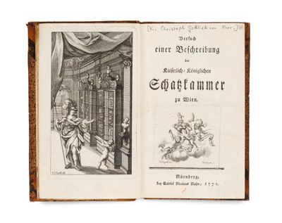 un livre ouvert sur lequel figure le dessin d'un homme et d'une femme dans une bibliothèque