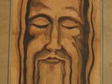 a painting of a man with long hair and a beard
