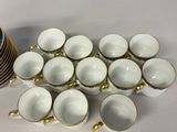 a lot of cups that are sitting on a table