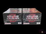 two boxes of cigarettes sitting on top of each other