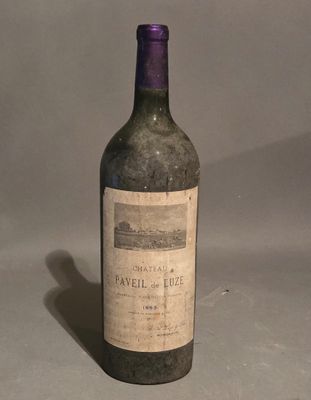a bottle of wine that is sitting on a table