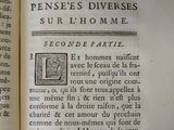 an open book with a picture of a man and a woman on it