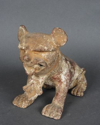 statue d'un chien coiffé d'un chapeau