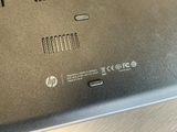 a close up of a laptop on a wooden table