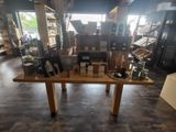 a table with a lot of items on it in a store