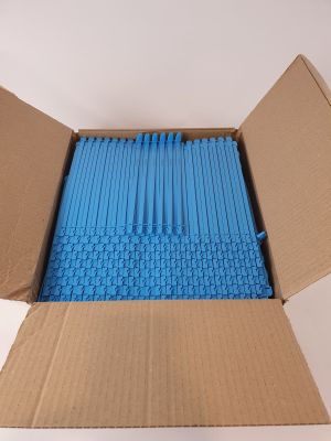 a cardboard box with a bunch of blue straws in it