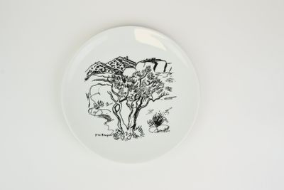 une assiette sur laquelle est dessiné une girafe