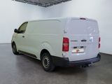 a white van that is parked in a room