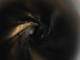 a close up of a black and white photo of a spiral