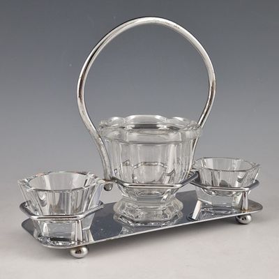 an image of a silver and glass tea set on a tray