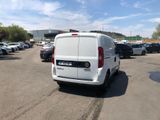 a white van that is parked in a parking lot