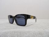 a close up of a pair of sunglasses on a table