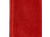 un cahier rouge avec une couverture rouge sur fond blanc
