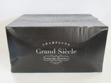 an image of a box of champagne sitting on top of a table