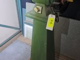 a machine that is sitting on a stand in a room