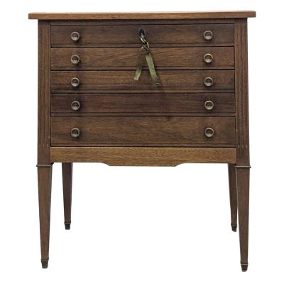 an image of a wooden chest of drawers with a clock on top of it