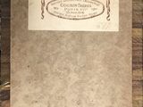 a close up of a piece of paper on a wooden table