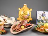 a lot of dishes that are sitting on a table