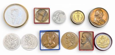 several different types of coins are arranged in a row