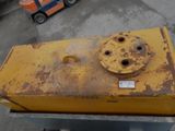 a yellow box sitting on top of a metal table