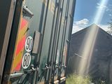 a truck that is parked on the side of the road