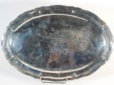 a silver tray with a picture of a man on it