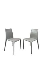 Suite de quatre chaises entièrement gainées de cuir gris. (photo 2)
