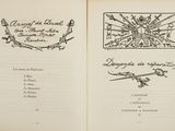 an open book with a drawing of a bird on it