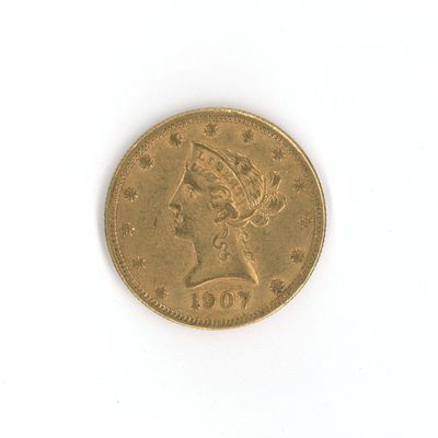 l'image d'une pièce d'or sur laquelle figure une tête de femme