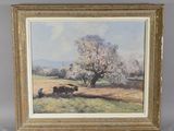 an oil painting of cows grazing in a field with a tree in the background