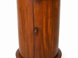 an image of a small wooden cabinet with a marble top