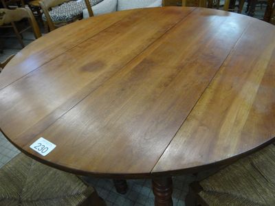 a wooden table with a label on it in a store