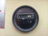 a close up picture of a meter on a wall