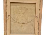 an old picture frame with a rope hanging from it