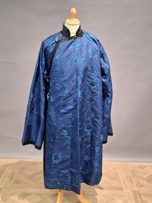 an image of a blue robe on a mannequin mannequin stand