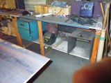 an image of a workbench with a computer on it