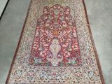 an image of a large oriental rug on the floor in a room