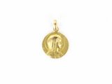une pièce d'or portant un visage de femme