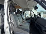 a white van that is parked in the parking lot