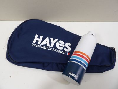 a blue bag with a bottle of water next to it