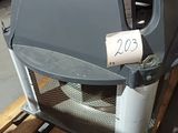 a metal object on a pallet with a price tag