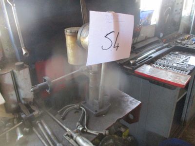 a picture of a machine that has a sign on it