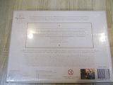 packaging of a box containing a bottle of wine on a wooden table