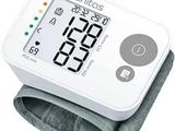 an image of a digital blood pressure monitor on a white background