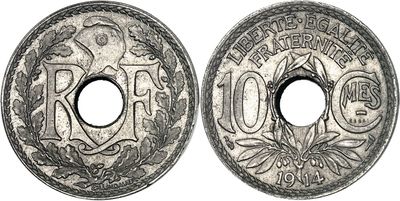a close up of two silver coins on a white background