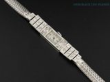 a lady ' s watch with a diamond set bracelet