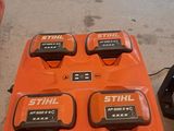 an image of a table with four batteries on top of it