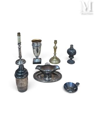 a lot of silver objects on a white surface